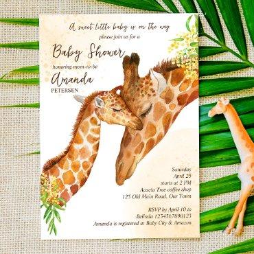 Baby on the way baby giraffe and mom